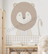 A hand-drawn cartoon image of a lion on a wall mural, designed for use in children's room decor.