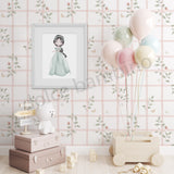 Children's room with pastel decor, balloons, and toys against a floral wallpaper.