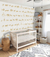 Children's room with beige wallpaper featuring a repeating pattern of safari animals like lions, zebras, and elephants in gold tones.