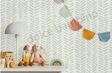 Children's room with toys, a lamp, and colorful wall decorations on a patterned wall.