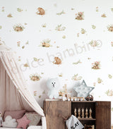 Woodland nursery wallpaper with cute forest animals, soft botanical details, and calming neutral tones by Dolce Bambino.