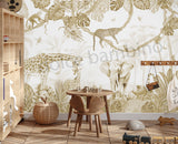 A styled children's room featuring a large wall mural with safari animal illustrations, including a giraffe, elephant, leopard, and palm leaves, in beige and brown tones on a white background. The room includes a light wood shelving unit, a small round wooden table and chair, a woven basket, and toys on the floor.