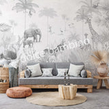 A room with a mighty jungle - monotone wall mural depicting a jungle scene with an elephant, giraffe, zebra, and flamingos in gray tones.