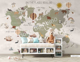 Children's room with a wall mural featuring a world map with animals and hot air balloons in a scandinavian style.