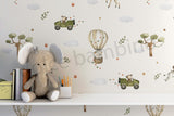 A whimsical wallpaper featuring cars and jungle animals in a playful design, displayed in a children's room with a wooden furniture set, rugs, and decorative items.