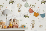 A whimsical wallpaper featuring cars and jungle animals in a playful design, displayed in a children's room with a wooden furniture set, and decorative items.