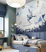 Children's bedroom with soccer-themed wall mural and bed.
