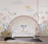 A-list Bollywood actress Soha Ali Khan's Daughter's bedroom with a crib, colorful wall mural, and decorative elements.