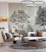 A room with a wall covered in a lush floral wallpaper featuring trees and leaves, creating a serene aesthetic.