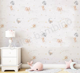 A wall adorned with whimsical seamless wallpaper featuring teddy bears, balloons, and stars in a nursery room setting.