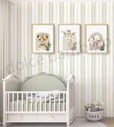 Kids bedroom with green-gold striped wallpaper,white crib,framed animal prints, and modern nursery furniture