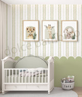 Nursery room with striped pattern scalloped wallpaper,a crib, framed animal prints on the wall, and a basket labeled 'TOYS'.