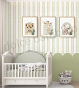 Children's room with stripes wallpaper with scallop, a crib, framed animal prints on the wall, and a toy basket.