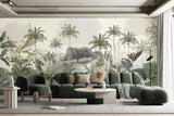 A room with walls covered in a vintage style wallpaper featuring lush trees and a serene landscape, with a modern armchair and bookshelf visible.