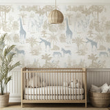 Nursery room with wooden crib, patterned wallpaper with animals, and decorative elements.
