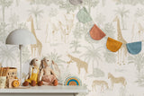 Children's room with a wallpapered wall with animal prints,toy animals,colorful decor, and a lamp.