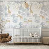Nursery room with animal-themed wallpaper,crib,and armchair.
