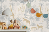 Children's room with wallpaper featuring animals, toys, and a lamp.