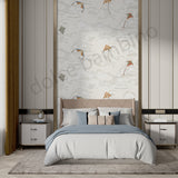 A styled bedroom interior featuring a bed with white and blue bedding, flanked by matching nightstands, set against a tall wall with vertical paneling and a patterned wallpaper of kites in the sky.