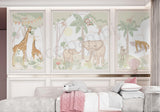 Hand-illustrated safari wallpaper with giraffes, elephants and monkeys in a kids’ room

