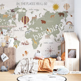 Children's room with a wall mural featuring a world map with animals and hot air balloons in a scandinavian style.