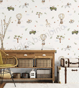 A whimsical wallpaper featuring cars and jungle animals in a playful design, displayed in a children's room with a wooden furniture set, rugs, and decorative items.