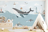 Children's room with a whale mural, teepee, and toys.