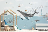 Children's room with whale mural, bed, and toys.