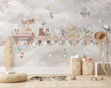 Children's bedroom with a white bed, decorative wall mural, and wooden toys.