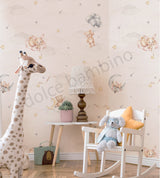 A wall adorned with whimsical seamless wallpaper featuring teddy bears, balloons, and stars in a nursery room setting.