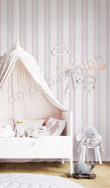 Children's bedroom with striped pattern wallpaper,a canopy bed, toys, and a cloud-shaped shelf.