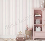 Children's room with striped pattern wallpaper, pink bookshelf,and toys.