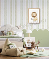 Children's room with striped pattern scalloped wallpaper, a lion poster on the wall, bean bag chair, and toys.