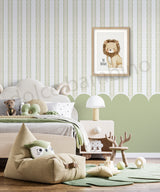 Children's room with striped pattern with scallops, lion artwork, bean bag, and toys on a wooden floor.