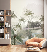A room with walls covered in a vintage style wallpaper featuring lush trees and a serene landscape, with a modern armchair and bookshelf visible.