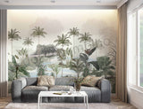 A room with walls covered in a vintage style wallpaper featuring lush trees and a serene landscape, with a modern armchair and bookshelf visible.