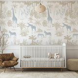 Nursery room with animal-themed wallpaper,crib, and armchair.