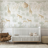 Nursery room with animal-themed wallpaper,crib,and armchair.