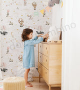  a decorative wallpaper featuring hot air balloons and animals.