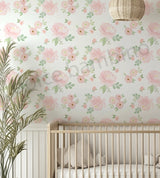 Nursery room with floral wallpaper, crib, and decorative elements.
